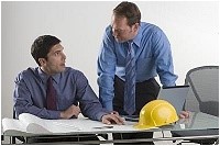 Engineer consulting with client